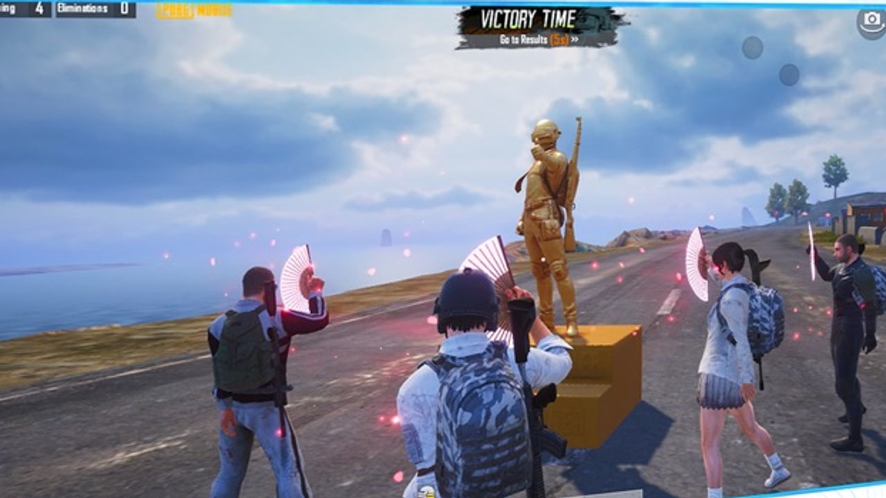 PUBG Mobile Lite victory pose on an Erangel roadside after a chicken dinner